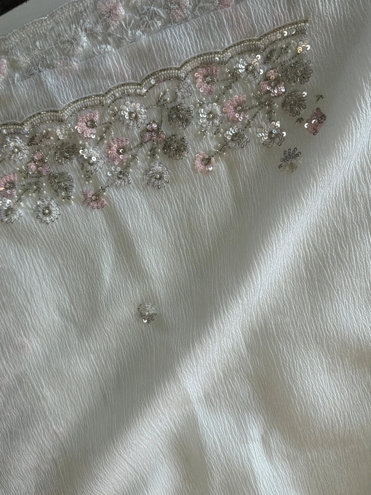 Platinum crushed crape off white saree / SR21646