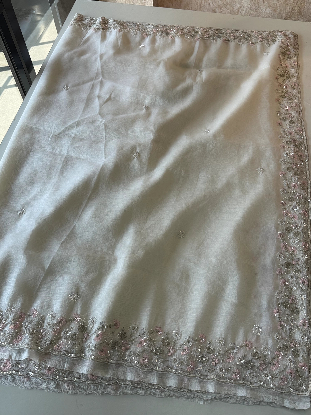 Platinum crushed crape off white saree / SR21646